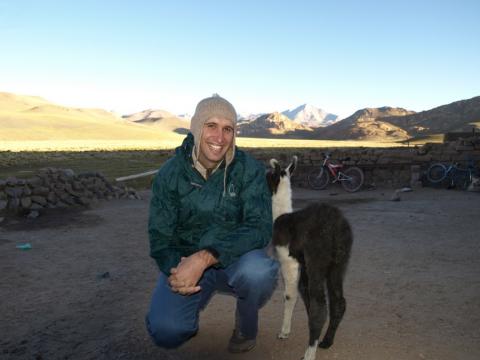 Greg with a Baby Llama on Salar de Uyuni trip in Bolivia